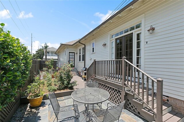 602 Jefferson Ave, New Orleans, LA 70115 - fenced backyard with a patio area and outdoor dining area