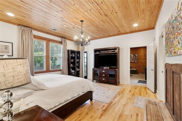 602 Jefferson Ave, New Orleans, LA 70115 - bedroom featuring wooden ceiling, wood finished floors, a chandelier, recessed lighting, and ensuite bath