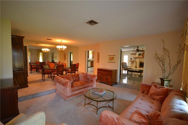 102 Apple Ct, Luling, LA 70070 - living area featuring a chandelier, light carpet, plenty of natural light, and ceiling fan