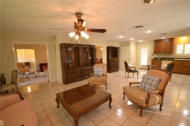102 Apple Ct, Luling, LA 70070 - living area featuring light tile patterned floors, ceiling fan, and recessed lighting