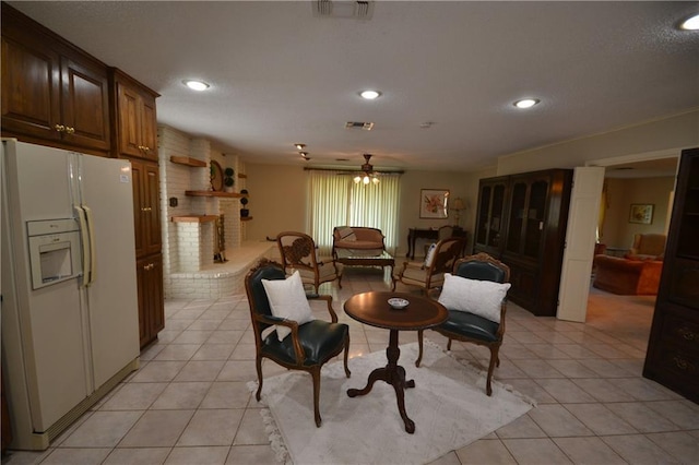 102 Apple Ct, Luling, LA 70070 - living area featuring light tile patterned flooring, ceiling fan, recessed lighting, and a fireplace