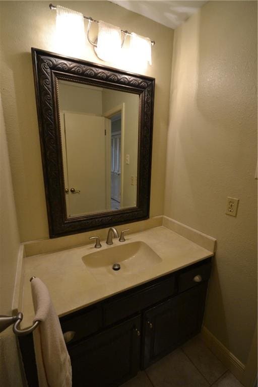 102 Apple Ct, Luling, LA 70070 - bathroom featuring vanity, tile patterned flooring, and baseboards