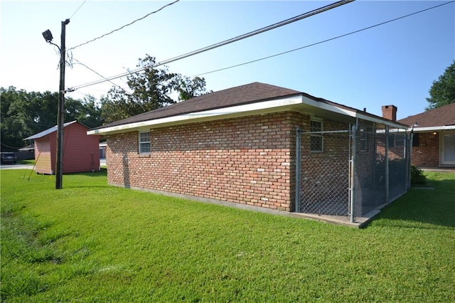 102 Apple Ct, Luling, LA 70070 - view of property exterior with brick siding and a lawn