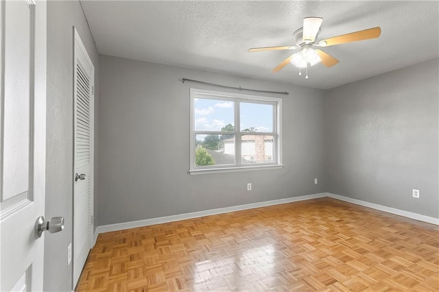 312 Tamarack St, Gretna, LA 70056 - unfurnished bedroom with a textured ceiling, baseboards, ceiling fan, and a closet