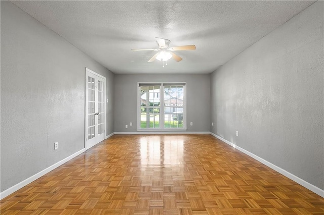 312 Tamarack St, Gretna, LA 70056 - empty room featuring a ceiling fan, baseboards, a textured ceiling, and a textured wall