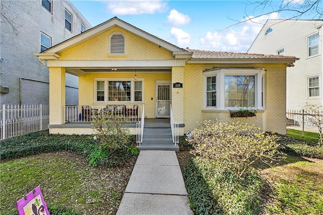 6118 Canal Blvd, New Orleans, LA 70124 - view of front of home with a porch and brick siding