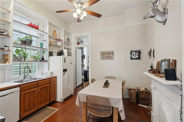 921-23 Hagan Ave, New Orleans, LA 70119 - kitchen featuring white appliances, open shelves, a sink, and brown cabinetry