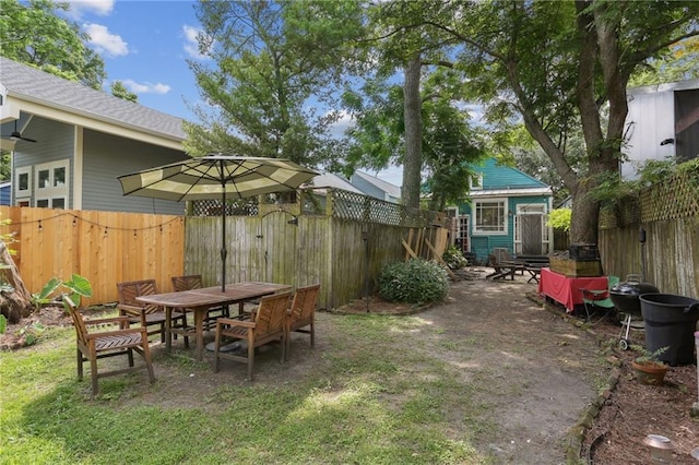 921-23 Hagan Ave, New Orleans, LA 70119 - fenced backyard featuring outdoor dining space