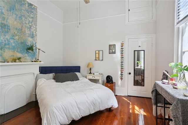 921-23 Hagan Ave, New Orleans, LA 70119 - bedroom featuring wood finished floors, a towering ceiling, and ceiling fan