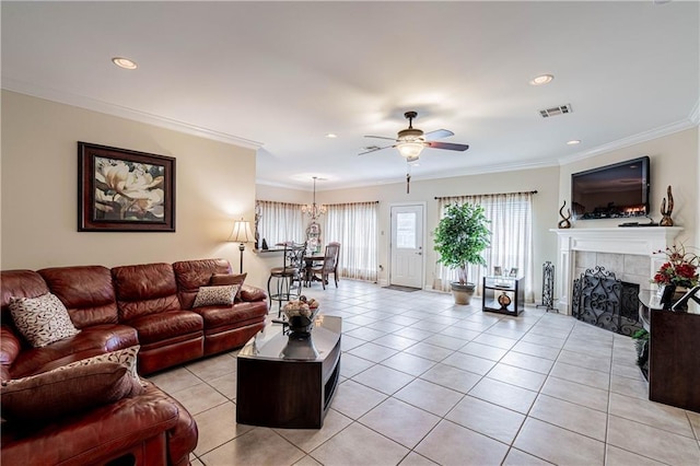 1326 Prentiss Ave, New Orleans, LA 70122 - living area featuring ceiling fan, light tile patterned floors, a fireplace, ornamental molding, and recessed lighting