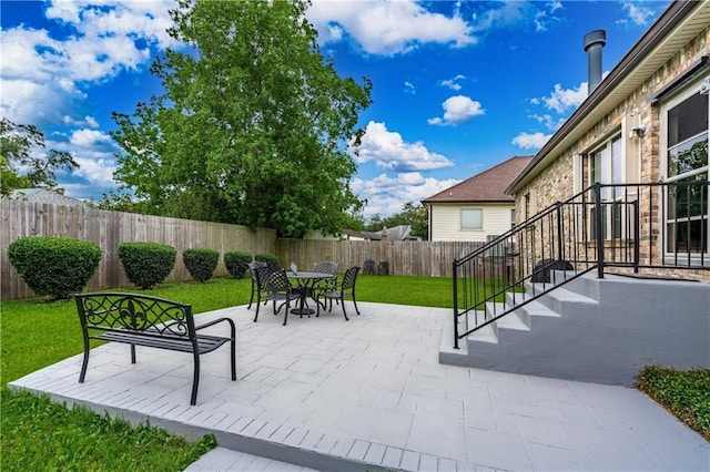 1326 Prentiss Ave, New Orleans, LA 70122 - view of patio featuring outdoor dining area