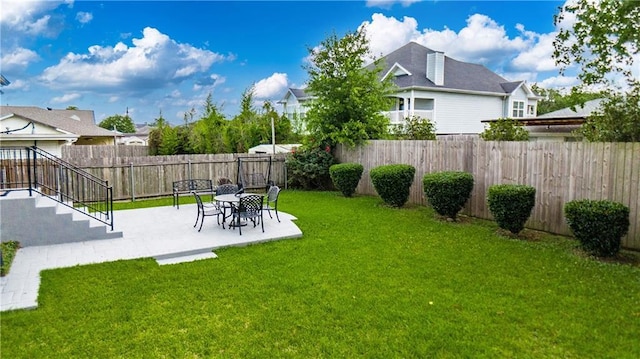 1326 Prentiss Ave, New Orleans, LA 70122 - view of yard featuring a patio