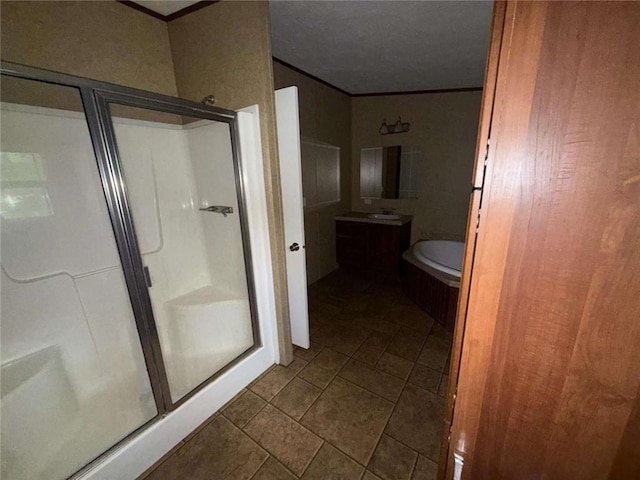 201 Sparrow St, New Iberia, LA 70563 - bathroom featuring a stall shower, vanity, ornamental molding, a bath, and tile patterned flooring