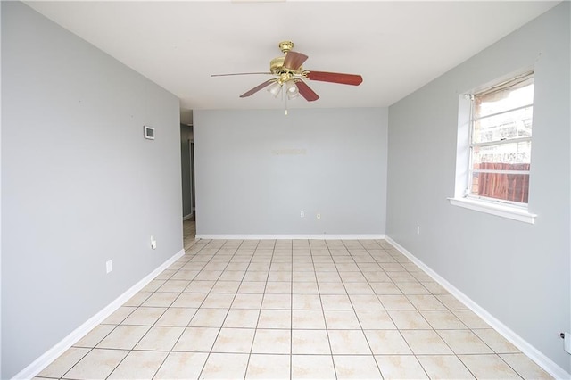 2804 Transcontinental Dr, Metairie, LA 70006 - spare room with ceiling fan and baseboards