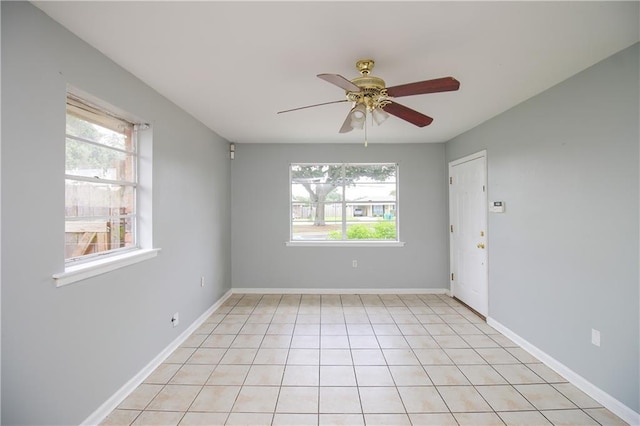 2804 Transcontinental Dr, Metairie, LA 70006 - unfurnished room with healthy amount of natural light, ceiling fan, and baseboards