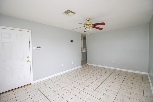 2804 Transcontinental Dr, Metairie, LA 70006 - empty room featuring ceiling fan, baseboards, and light tile patterned flooring