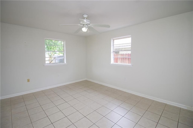 2804 Transcontinental Dr, Metairie, LA 70006 - spare room with a ceiling fan and baseboards