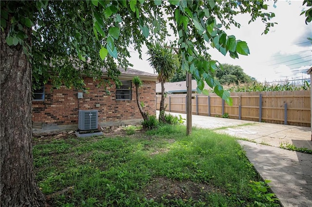 2804 Transcontinental Dr, Metairie, LA 70006 - view of yard featuring central AC and a patio