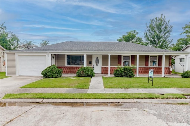 1801 River Oaks Dr, New Orleans, LA 70131 - ranch-style home featuring brick siding, covered porch, an attached garage, and driveway