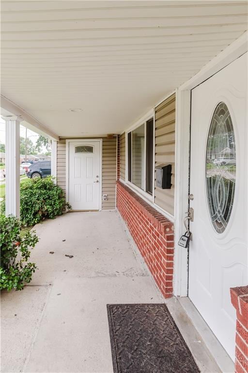1801 River Oaks Dr, New Orleans, LA 70131 - property entrance featuring brick siding