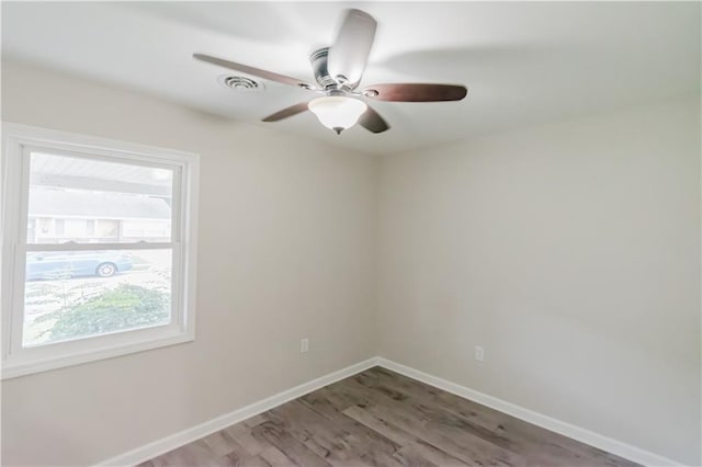 1801 River Oaks Dr, New Orleans, LA 70131 - empty room featuring wood finished floors, ceiling fan, and baseboards