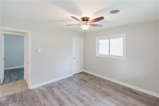 1801 River Oaks Dr, New Orleans, LA 70131 - empty room with ceiling fan, light wood-style flooring, and baseboards