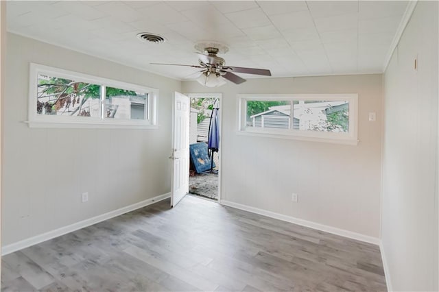 1801 River Oaks Dr, New Orleans, LA 70131 - empty room featuring wood finished floors, a ceiling fan, and baseboards