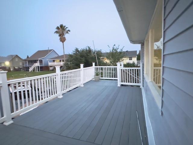 4231 San Trovaso St, New Orleans, LA 70129 - wooden deck with a residential view
