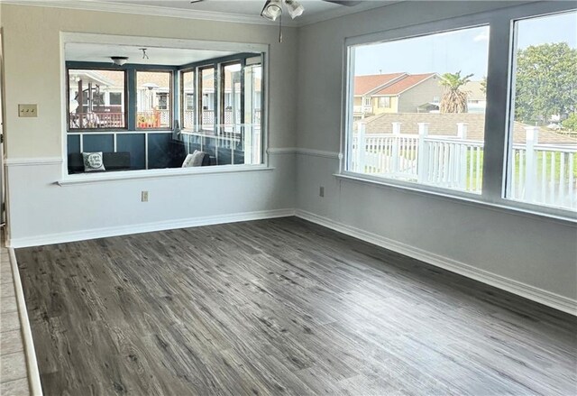 4231 San Trovaso St, New Orleans, LA 70129 - empty room featuring ceiling fan, wood finished floors, and ornamental molding