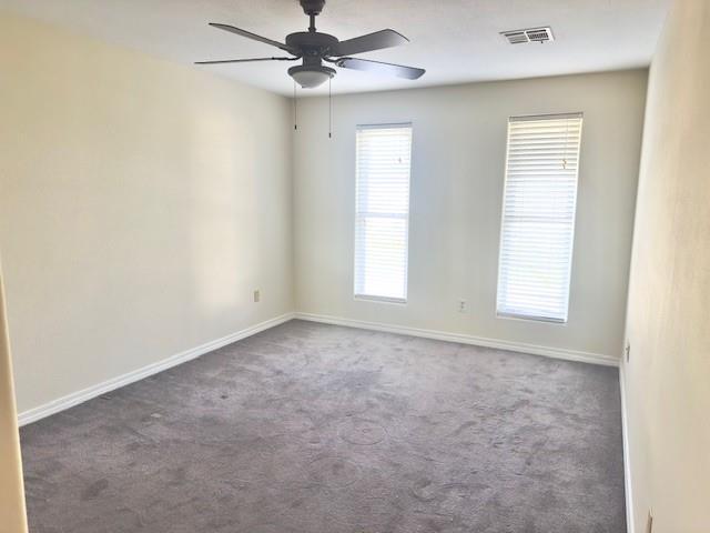 4231 San Trovaso St, New Orleans, LA 70129 - carpeted empty room featuring a ceiling fan and baseboards
