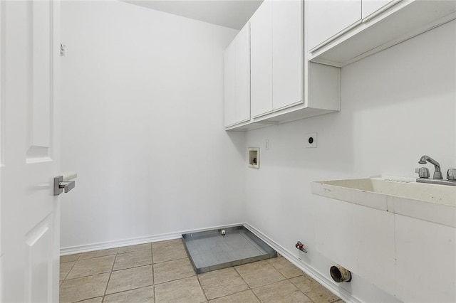 155 Sauve Rd, River Ridge, LA 70123 - laundry room featuring cabinet space, washer hookup, hookup for an electric dryer, hookup for a gas dryer, and baseboards