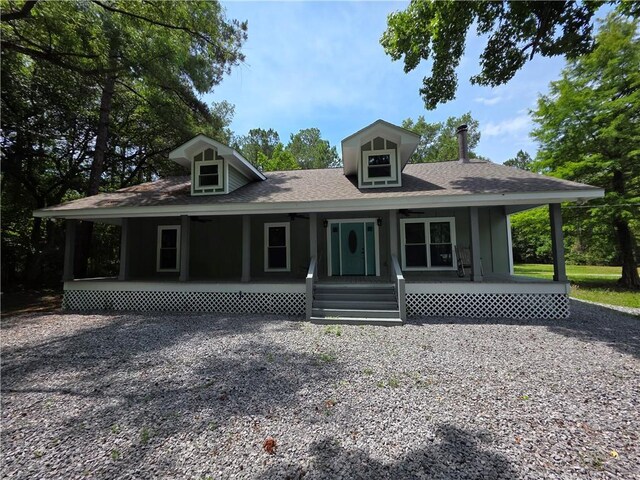 59478 S Tranquility Rd, Lacombe, LA 70445 - view of front of house featuring a porch and a shingled roof