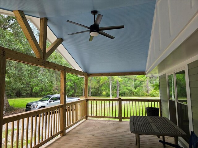 59478 S Tranquility Rd, Lacombe, LA 70445 - wooden deck featuring ceiling fan and a lawn