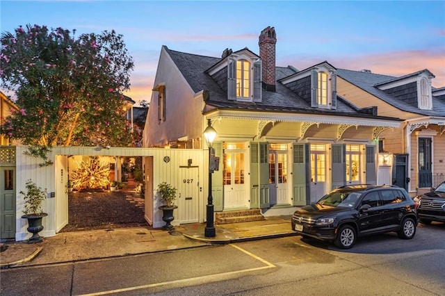 927 Dauphine St, New Orleans, LA 70116 - view of front of property with a chimney