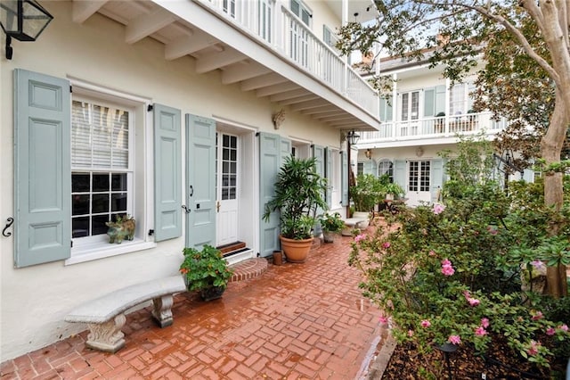 927 Dauphine St, New Orleans, LA 70116 - view of exterior entry with stucco siding