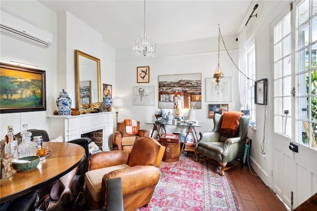 927 Dauphine St, New Orleans, LA 70116 - living area with a wall mounted AC, a chandelier, and a fireplace