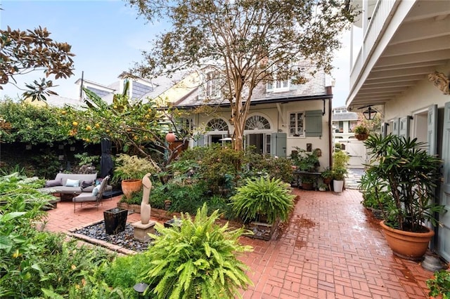 927 Dauphine St, New Orleans, LA 70116 - view of yard with an outdoor living space and a patio