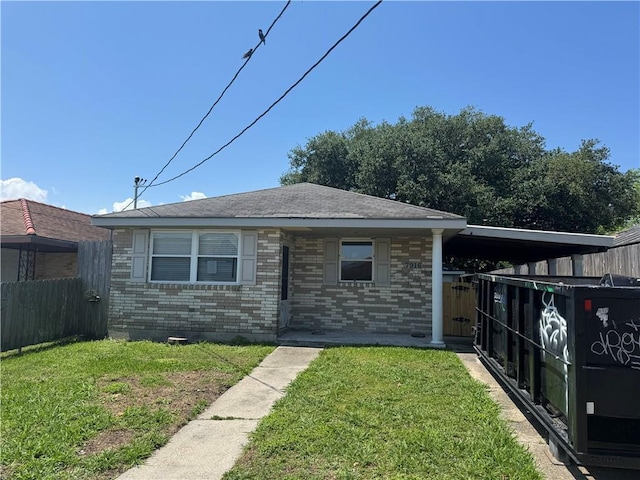 7916 Unity Dr, New Orleans, LA 70128 - rear view of property with brick siding