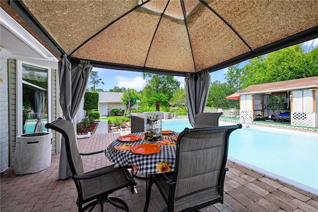 581 S Military Rd, Slidell, LA 70461 - view of patio with a gazebo and outdoor dining space