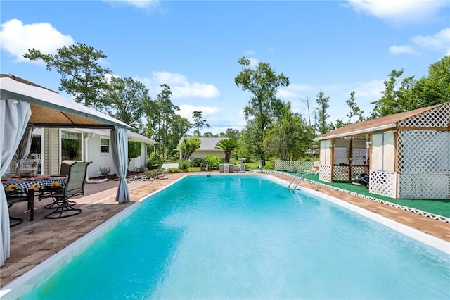 581 S Military Rd, Slidell, LA 70461 - view of swimming pool featuring a patio
