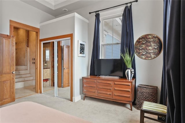 4716 Annunciation St Unit 3A, New Orleans, LA 70115 - bedroom with light colored carpet and connected bathroom