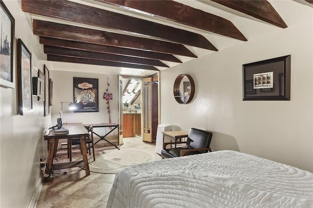 4716 Annunciation St Unit 3A, New Orleans, LA 70115 - bedroom with beam ceiling and stone finish floors