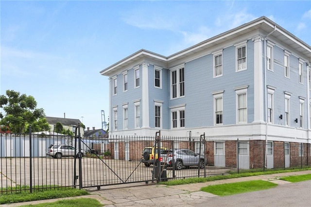 4716 Annunciation St Unit 3A, New Orleans, LA 70115 - view of front of house featuring a fenced front yard