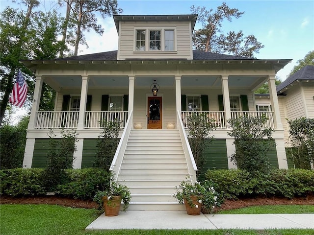 607 E 3rd Ave, Covington, LA 70433 - view of front of property with stairs and a porch
