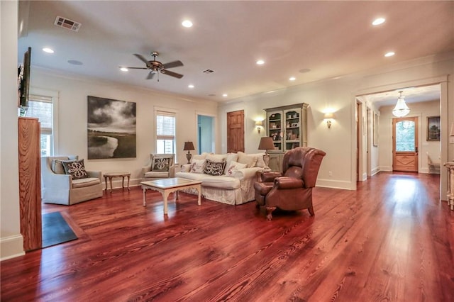 607 E 3rd Ave, Covington, LA 70433 - living area with ornamental molding, dark wood-style floors, recessed lighting, a ceiling fan, and baseboards