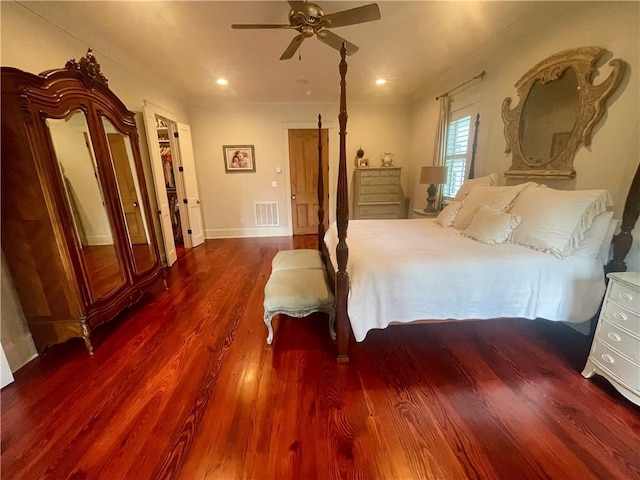 607 E 3rd Ave, Covington, LA 70433 - bedroom featuring wood finished floors, ceiling fan, recessed lighting, and baseboards