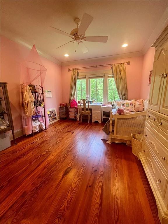 607 E 3rd Ave, Covington, LA 70433 - bedroom featuring dark wood-style flooring, ornamental molding, a ceiling fan, and recessed lighting