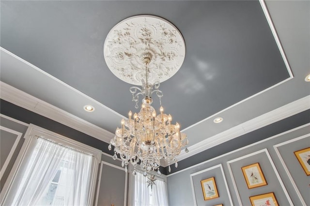 827 Burgundy St Unit C, New Orleans, LA 70116 - detailed view of a chandelier, crown molding, and recessed lighting