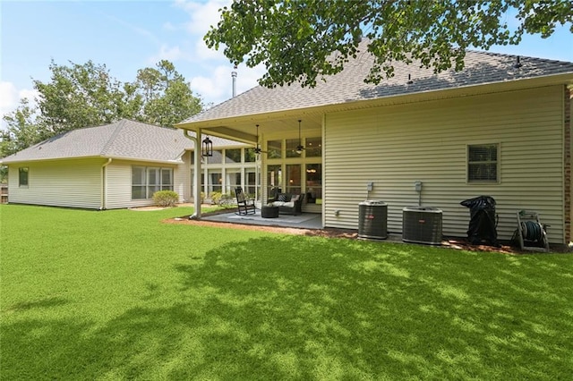 1132 Scarlet Oak Ln, Mandeville, LA 70448 - back of house with a lawn, central AC unit, a patio, and a ceiling fan
