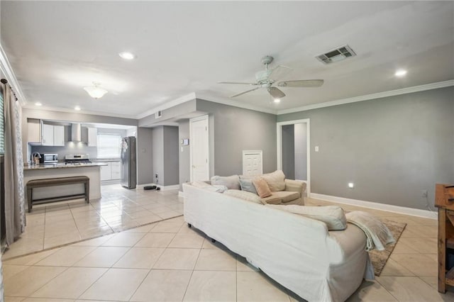 200 Pike Dr, Gretna, LA 70053 - living room featuring light tile patterned flooring, ornamental molding, baseboards, recessed lighting, and ceiling fan